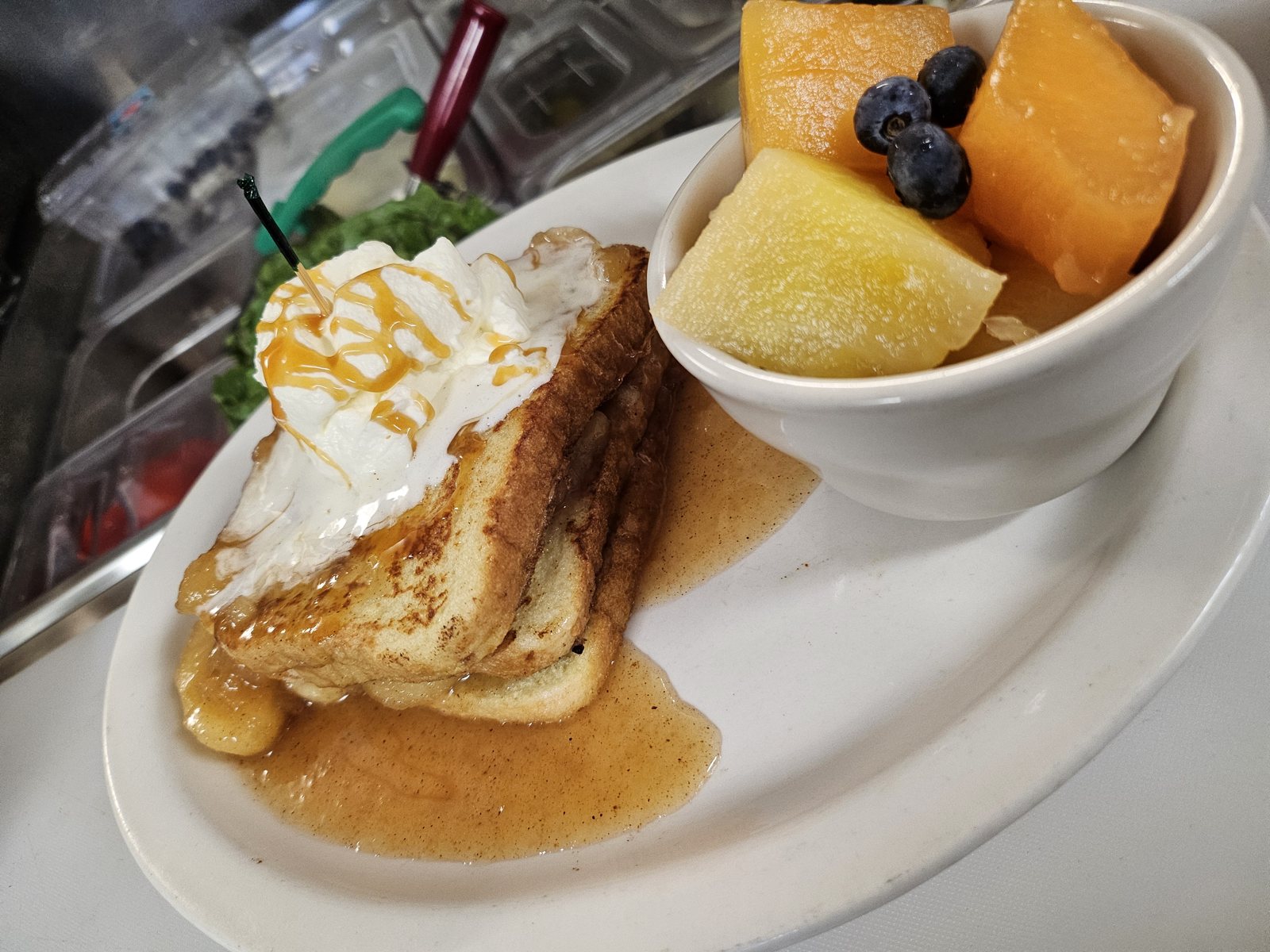 French toast with whipped cream and fruit